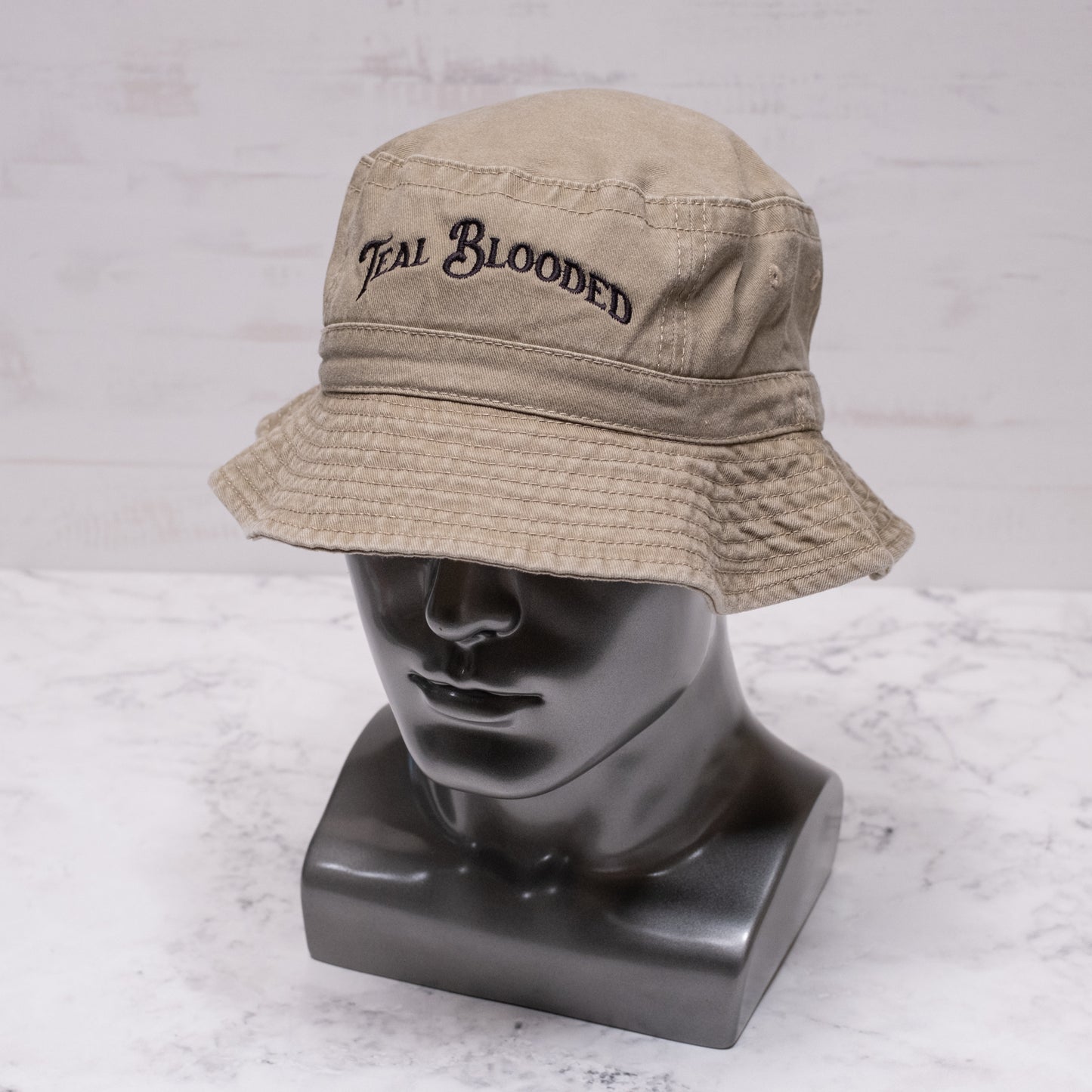 Teal Blooded bucket hat