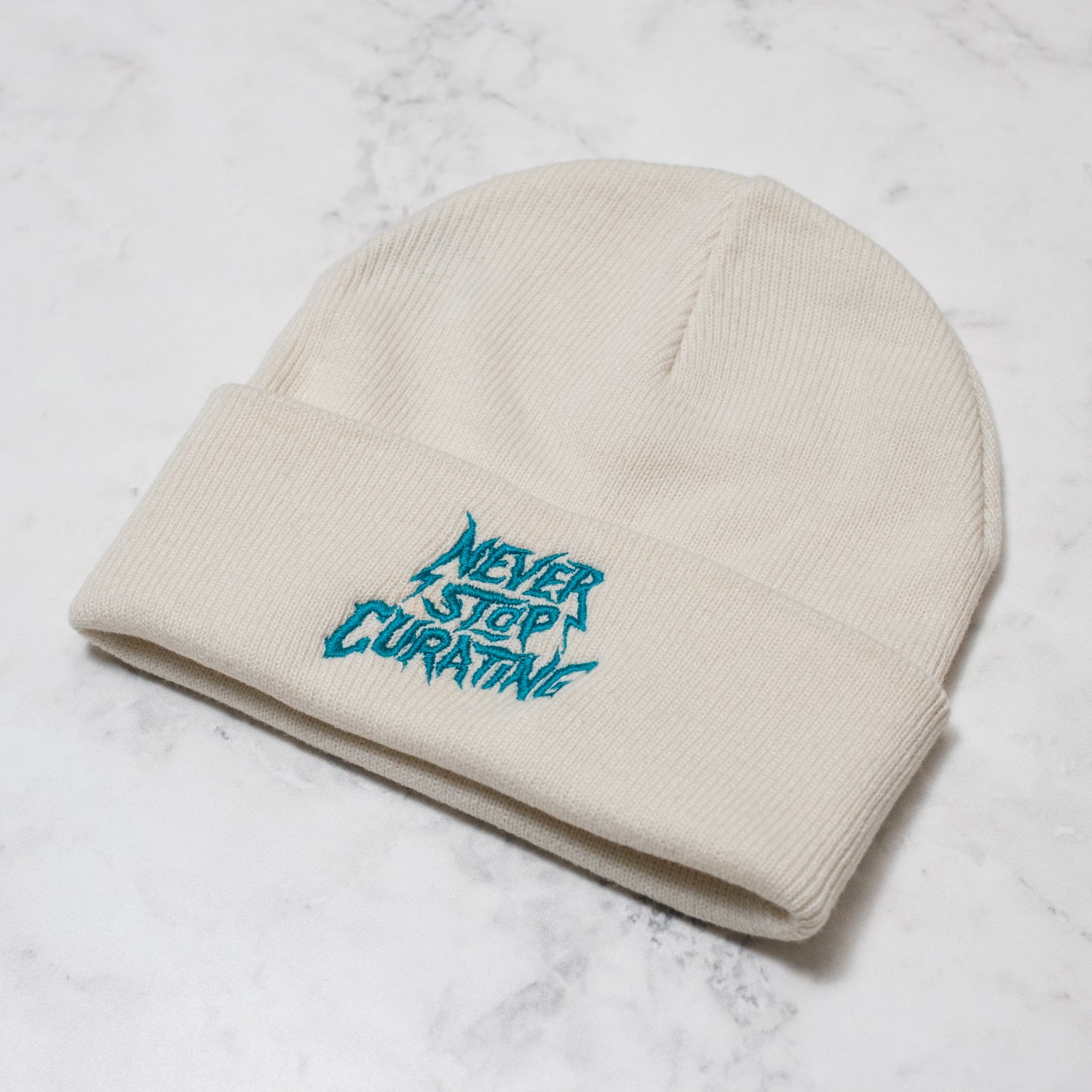 1 of 1 Never Stop Curating Beanie