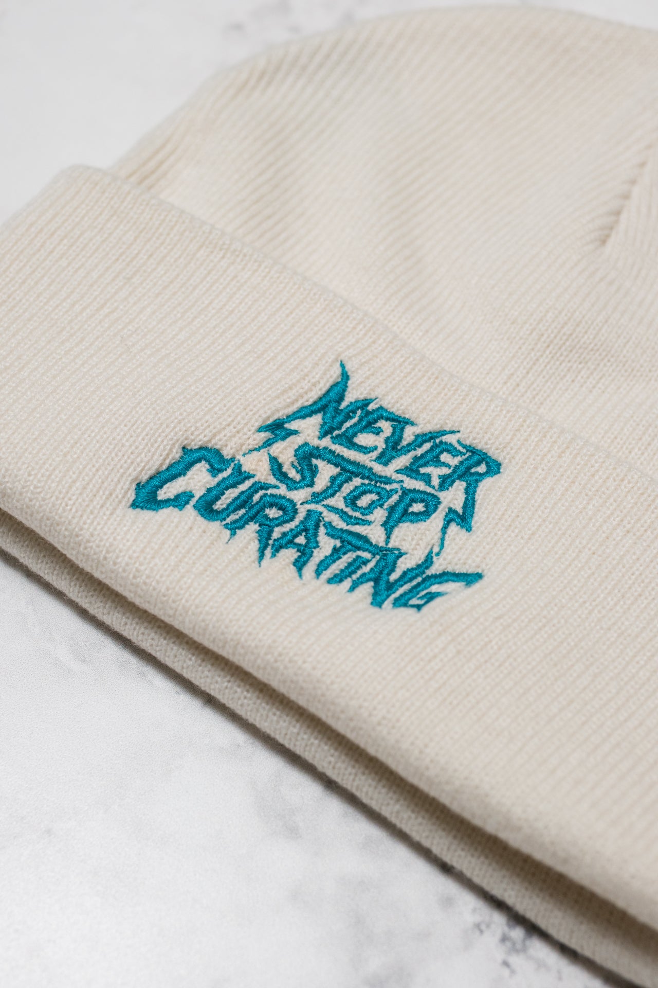 1 of 1 Never Stop Curating Beanie