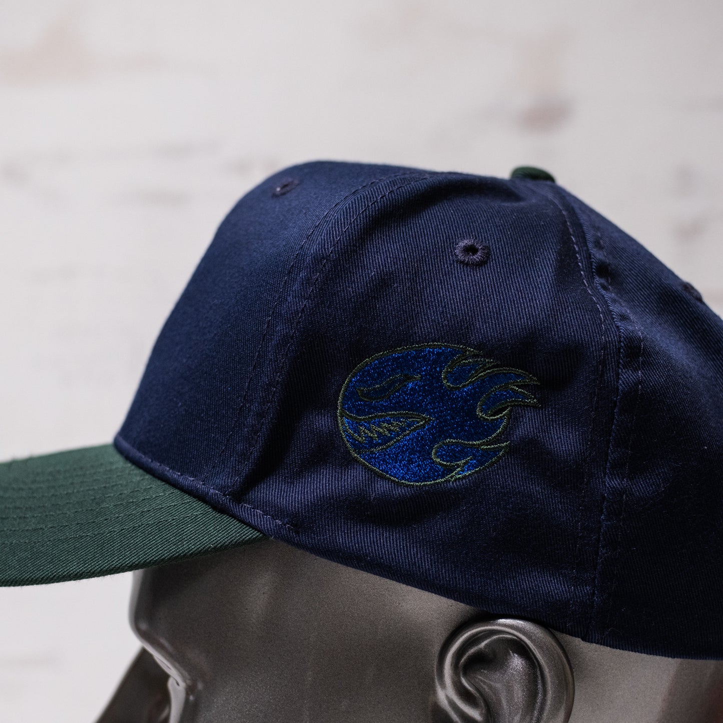 1 of 1 Capsmith Shark Baseball Cap on Nvy/Drk Green